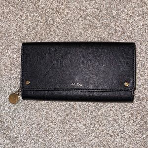 ALDO never used black and gold clutch